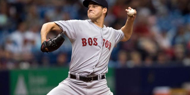 Sep 13, 2015; St. Petersburg, FL, USA; Boston Red Sox starting pitcher Rich Hill (62) delivers a pitch in the second inning against the Tampa Bay Rays at Tropicana Field. Mandatory Credit: Jeff Griffith-USA TODAY Sports