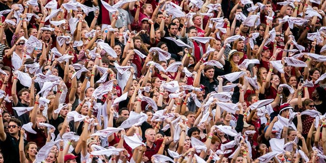 Sep 13, 2014; Columbia, SC, USA; South Carolina Gamecocks fans wave towels in the game against the Georgia Bulldogs in the first quarter at Williams-Brice Stadium. Mandatory Credit: Jeff Blake-USA TODAY Sports