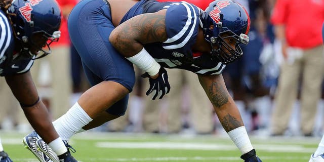 Sep 13, 2014; Oxford, MS, USA; Mississippi Rebels defensive tackle Robert Nkemdiche (5) steps up to the line during the game against the Louisiana-Lafayette Ragin Cajuns at Vaught-Hemingway Stadium. Mandatory Credit: Spruce Derden-USA TODAY Sports