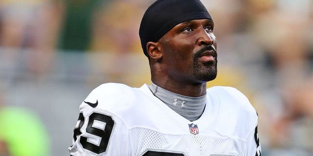 GREEN BAY, WI - AUGUST 22: James Jones #89 of the Oakland Raiders warms up prior to a preseason game against the Green Bay Packers at Lambeau Field on August 22, 2014 in Green Bay, Wisconsin. The Packers defeated the Raiders 31-21. (Photo by John Konstantaras/Getty Images)