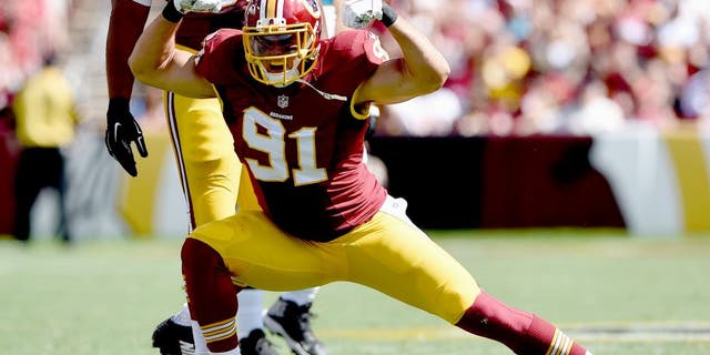 LANDOVER, MD - SEPTEMBER 14: Outside linebacker Ryan Kerrigan #91 of the Washington Redskins celebreates after recording a second quarter sack during a game against the Jacksonville Jaguars at FedExField on September 14, 2014 in Landover, Maryland. (Photo by Patrick Smith/Getty Images)