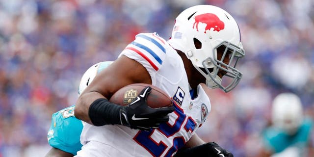 Sep 14, 2014; Orchard Park, NY, USA; Buffalo Bills running back Fred Jackson (22) runs after a catch during the first quarter against the Miami Dolphins at Ralph Wilson Stadium. Mandatory Credit: Kevin Hoffman-USA TODAY Sports