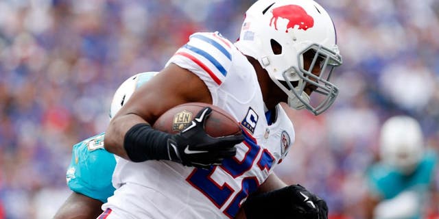 Sep 14, 2014; Orchard Park, NY, USA; Buffalo Bills running back Fred Jackson (22) runs after a catch during the first quarter against the Miami Dolphins at Ralph Wilson Stadium. Mandatory Credit: Kevin Hoffman-USA TODAY Sports