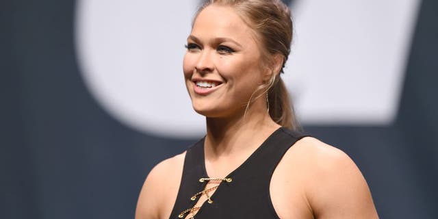 LAS VEGAS, NV - SEPTEMBER 04: UFC women's bantamweight champion Ronda Rousey speaks to the fans during the UFC's Go Big launch event inside MGM Grand Garden Arena on September 4, 2015 in Las Vegas, Nevada. (Photo by Josh Hedges/Zuffa LLC/Zuffa LLC via Getty Images)