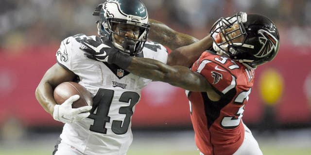 Sep 14, 2015; Atlanta, GA, USA; Philadelphia Eagles running back Darren Sproles (43) is tackled by Atlanta Falcons cornerback Ricardo Allen (37) in the third quarter at the Georgia Dome. Mandatory Credit: Dale Zanine-USA TODAY Sports
