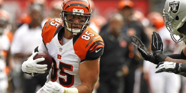 Sep 13, 2015; Oakland, CA, USA; Cincinnati Bengals tight end Tyler Eifert (85) runs with the ball after making a catch against the Oakland Raiders in the first quarter at O.co Coliseum.
