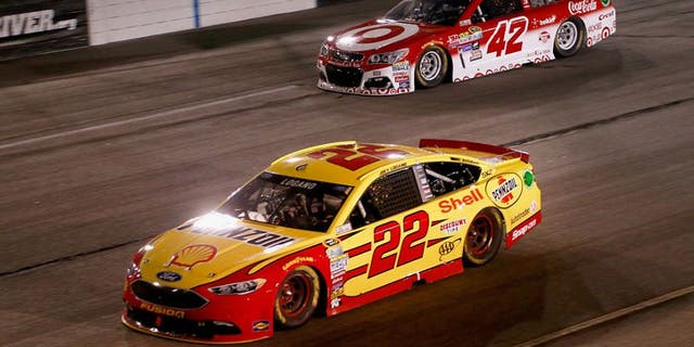 RICHMOND, VA - SEPTEMBER 10: Joey Logano, driver of the #22 Shell Pennzoil Ford, races Kyle Larson, driver of the #42 Target Chevrolet, during the NASCAR Sprint Cup Series Federated Auto Parts 400 at Richmond International Raceway on September 10, 2016 in Richmond, Virginia. (Photo by Matt Sullivan/NASCAR via Getty Images)