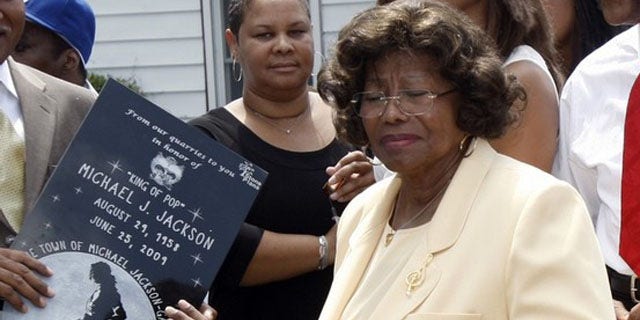 June 25: Katherine Jackson, mother of pop star Michael Jackson, attends a ceremony at the family's old home in Gary, Indiana.