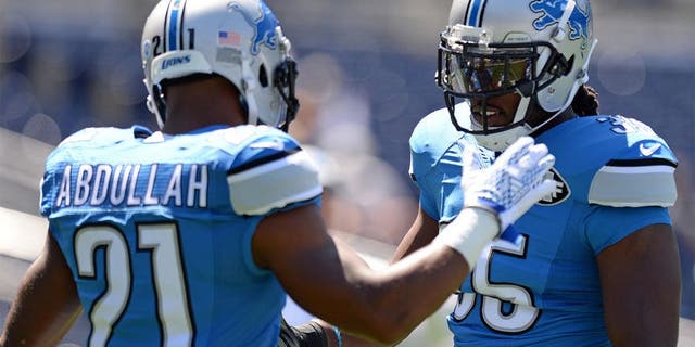 Sep 13, 2015; San Diego, CA, USA; Detroit Lions running back Joique Bell (35) and running back Ameer Abdullah (21) give each other five before the game against the San Diego Chargers at Qualcomm Stadium. Mandatory Credit: Jake Roth-USA TODAY Sports