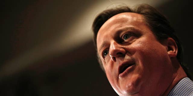 Britain's Prime Minister and leader of the Conservative Party, David Cameron, gives a speech during his general election campaign visit at the Institute of Chartered Accountants in London on Monday April 27, 2015. Britain goes to the polls on May 7 to elect a new parliament. (Adrian Dennis/Pool Photo via AP)