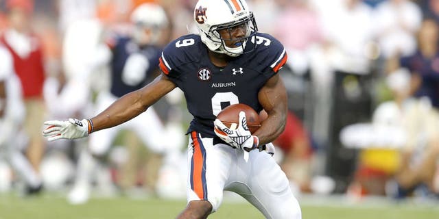 AUBURN, AL - AUGUST 30: Defensive back Jermaine Whitehead #9 of the Auburn Tigers intercepts a pass during the game against the Arkansas Razorbacks at Jordan Hare Stadium on August 30, 2014 in Auburn, Alabama. (Photo by Mike Zarrilli/Getty Images)