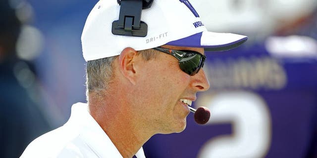 Sep 13, 2014; Seattle, WA, USA; Washington Huskies head coach Chris Petersen stands on the sideline during the second half against the Illinois Fighting Illini at Husky Stadium. Mandatory Credit: Joe Nicholson-USA TODAY Sports