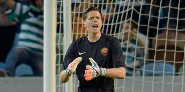 LISBON, PORTUGAL - AUGUST 01: AS Roma player Wojciech Szczesny reacts during the pre-season friendly match between Sporting CP and AS Roma at Estadio Jose Alvalade on August 1, 2015 in Lisbon, Portugal. (Photo by Luciano Rossi/AS Roma via Getty Images)