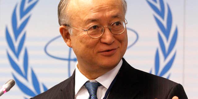 File-This April 4, 2011, file photo shows Director General of the International Atomic Energy Agency, IAEA, Yukiya Amano from Japan speaking during a news conference of the IAEA's Parties to Nuclear Safety Convention Hold Review at the International Center in Vienna, Austria.