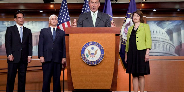 Sept. 15: House Minority Leader John Boehner of Ohio, gestures during a news conference on Capitol Hill in Washington. From left are, House Minority Whip Eric Cantor of Va., Rep. Mike Pence, R-Ind., Boehner, and Rep. Cathy McMorris Rodgers, R-Wash.