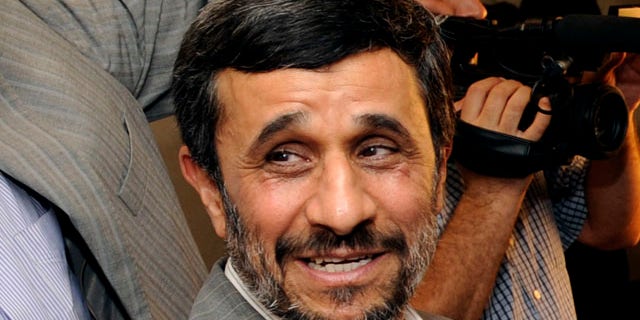 The report specifically names Iranian President Mahmoud Ahmadinejad as a violator of religious freedom. (AP)