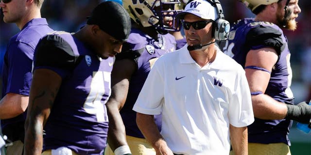 Sep 6, 2014; Seattle, WA, USA; Washington Huskies head coach Chris Petersen during the second half against the Eastern Washington Eagles at Husky Stadium. Washington defeated Eastern Washington 59-52. Mandatory Credit: Steven Bisig-USA TODAY Sports