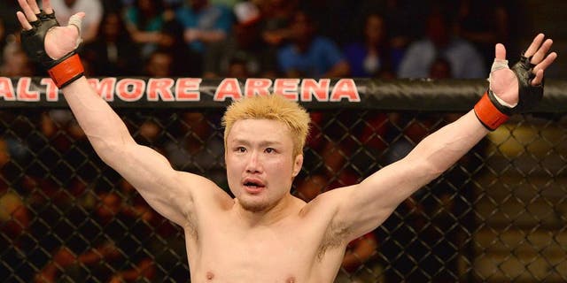 BALTIMORE, MD - APRIL 26: Takanori Gomi reacts to the crowd's applause before the third round of his lightweight bout against Isaac Vallie-Flagg during the UFC 172 event at the Baltimore Arena on April 26, 2014 in Baltimore, Maryland. (Photo by Patrick Smith/Zuffa LLC/Zuffa LLC via Getty Images)