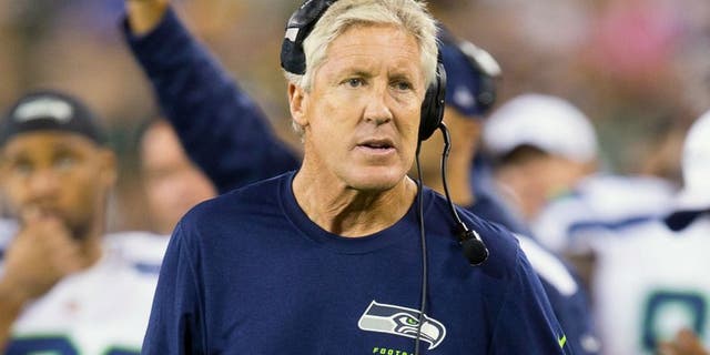 Aug 23, 2013; Green Bay, WI, USA; Seattle Seahawks head coach Pete Carroll during the game against the Green Bay Packers at Lambeau Field. Seattle won 17-10. Mandatory Credit: Jeff Hanisch-USA TODAY Sports