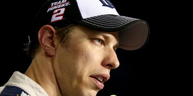RICHMOND, VA - SEPTEMBER 10: Brad Keselowski, driver of the #2 Miller Lite Ford, stands on the grid after the NASCAR Sprint Cup Series Federated Auto Parts 400 at Richmond International Raceway on September 10, 2016 in Richmond, Virginia. (Photo by Sarah Crabill/Getty Images)