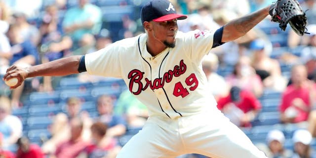 ATLANTA, GA - SEPTEMBER 20: Julio Teheran #49 of the Atlanta Braves throws a second inning pitch against the Philadelphia Philiies at Turner Field on September 20, 2015 in Atlanta, Georgia. (Photo by Scott Cunningham/Getty Images)