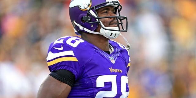 Aug 9, 2015; Canton, OH, USA; Minnesota Vikings running back Adrian Peterson (28) against the Pittsburgh Steelers at Tom Benson Hall of Fame Stadium. Mandatory Credit: Andrew Weber-USA TODAY Sports