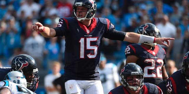 Sep 20, 2015; Charlotte, NC, USA; Houston Texans quarterback Ryan Mallett (15) signals in the fourth quarter. The Panthers defeated the Texans 24-17 at Bank of America Stadium. Mandatory Credit: Bob Donnan-USA TODAY Sports