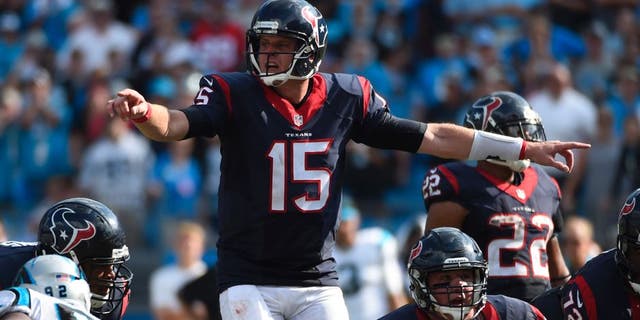 Sep 20, 2015; Charlotte, NC, USA; Houston Texans quarterback Ryan Mallett (15) signals in the fourth quarter. The Panthers defeated the Texans 24-17 at Bank of America Stadium. Mandatory Credit: Bob Donnan-USA TODAY Sports