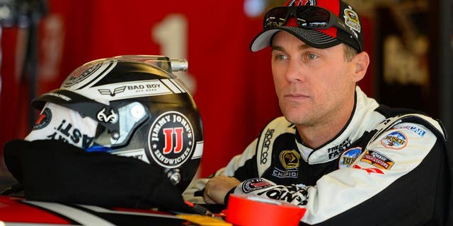 JOLIET, IL - SEPTEMBER 17: Kevin Harvick, driver of the #4 Jimmy John's Chevrolet, stands in the garage area during practice for the NASCAR Sprint Cup Series Teenage Mutant Ninja Turtles 400 at Chicagoland Speedway on September 17, 2016 in Joliet, Illinois. (Photo by Robert Laberge/Getty Images)