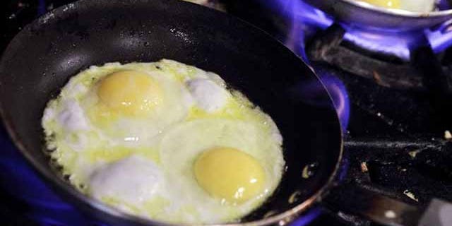SAN RAFAEL, CA - AUGUST 26: Eggs cook in pans at Lundy's Home Cooking on August 26, 2010 in San Rafael, California. Egg prices have skyrocketed nearly 40 percent since two Iowa egg farms have recalled more than a half billion eggs that are believed to have sickened 1,300 people with Salmomella poisining in several states. (Photo by Justin Sullivan/Getty Images)