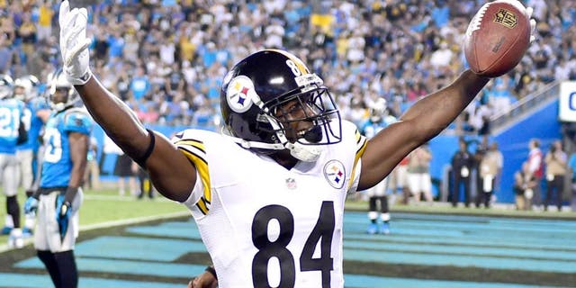 Sep 21, 2014; Charlotte, NC, USA; Pittsburgh Steelers wide receiver Antonio Brown (84) reacts after scoring a touchdown in the third quarter at Bank of America Stadium. Mandatory Credit: Bob Donnan-USA TODAY Sports