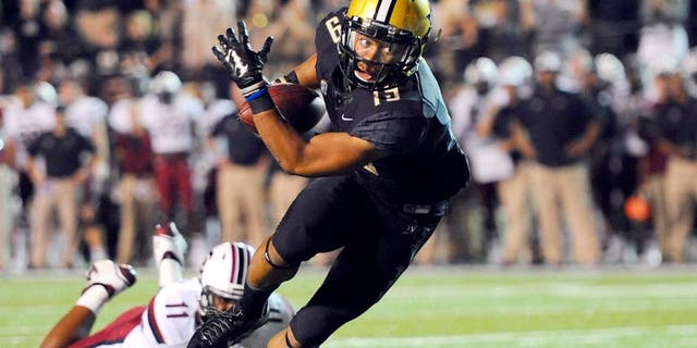 Sep 20, 2014; Nashville, TN, USA; Vanderbilt Commodores receiver C.J. Duncan (19) scores on an eight yard touchdown reception during the first half against the South Carolina Gamecocks at Vanderbilt Stadium. Mandatory Credit: Christopher Hanewinckel-USA TODAY Sports