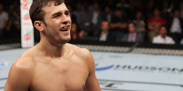 SAITAMA, JAPAN - SEPTEMBER 20: Myles Jury reacts after his win over Takanori Gomi in their lightweight bout during the UFC Fight Night event inside the Saitama Arena on September 20, 2014 in Saitama, Japan. (Photo by Mitch Viquez/Zuffa LLC/Zuffa LLC via Getty Images)