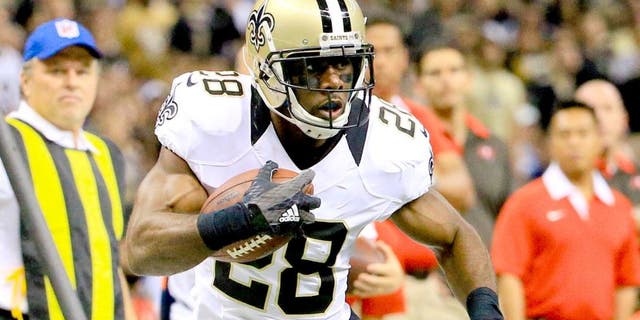 Sep 20, 2015; New Orleans, LA, USA; New Orleans Saints running back C.J. Spiller (28) carries the ball against the Tampa Bay Buccaneers during the second half of a game at the Mercedes-Benz Superdome. The Buccaneers won 26-19. Mandatory Credit: Derick E. Hingle-USA TODAY Sports