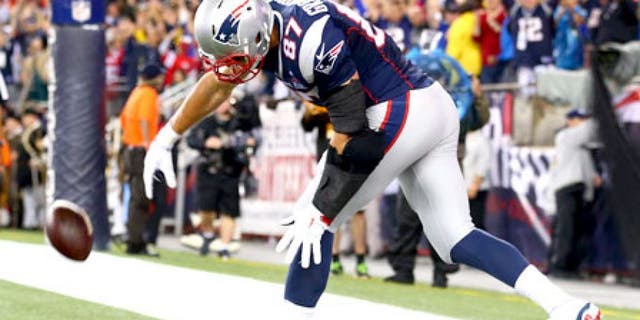FOXBORO, MA - SEPTEMBER 10: Rob Gronkowski #87 of the New England Patriots spikes the ball to celebrate his touchdown in the second quarter against the Pittsburgh Steelers at Gillette Stadium on September 10, 2015 in Foxboro, Massachusetts. (Photo by Maddie Meyer/Getty Images)