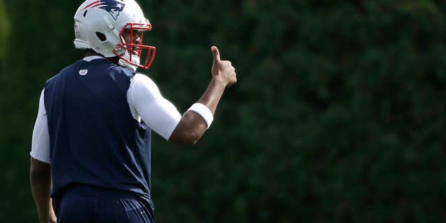 New England Patriots quarterback Jacoby Brissett gives a thumbs up during an NFL football team practice Tuesday, Sept. 20, 2016, in Foxborough, Mass.