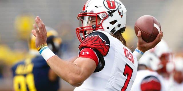 Sep 20, 2014; Ann Arbor, MI, USA; Utah Utes quarterback Travis Wilson (7) warms up before the game against the Michigan Wolverines at Michigan Stadium. Mandatory Credit: Rick Osentoski-USA TODAY Sports