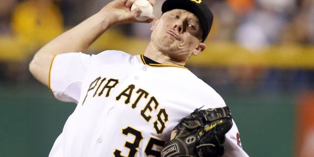 Sep 18, 2014; Pittsburgh, PA, USA; Pittsburgh Pirates relief pitcher Mark Melancon (35) pitches against the Boston Red Sox during the ninth inning at PNC Park. The Pirates won 3-2. Mandatory Credit: Charles LeClaire-USA TODAY Sports