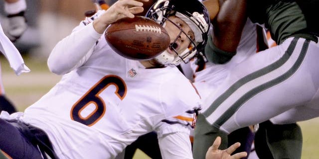 Sep 22, 2014; East Rutherford, NJ, USA; Chicago Bears quarterback Jay Cutler (6) fumbles the ball during the first half against the New York Jets at MetLife Stadium. Mandatory Credit: Robert Deutsch-USA TODAY Sports