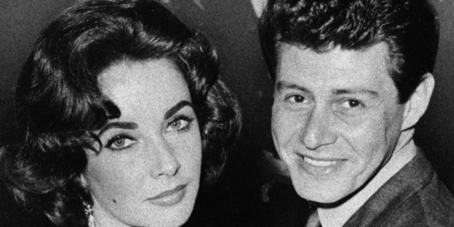 In this 1959 file photo, actress Elizabeth Taylor is seen with singer Eddie Fisher before their marriage. Fisher, whose huge fame as a pop singer was overshadowed by scandals ending his marriages to Debbie Reynolds and Taylor, died Wednesday night, Sept. 22, of complications from hip surgery at a hospital in Berkeley.