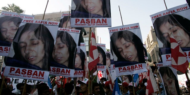 Sept. 23: Pakistani protesters rally near to condemn the arrest of alleged Al Qaeda suspect Aafia Siddiqui.