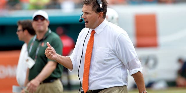 Sep 13, 2014; Miami Gardens, FL, USA; Miami Hurricanes head coach Al Golden reacts on the sideline during the first half against the Arkansas State Red Wolves at Sun Life Stadium. Mandatory Credit: Steve Mitchell-USA TODAY Sports
