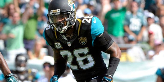 Sep 7, 2014; Philadelphia, PA, USA; Philadelphia Eagles running back Darren Sproles (43) out runs Jacksonville Jaguars free safety Josh Evans (26) on the way to a 49-yard touchdown run in the third quarter against the Jacksonville Jaguars at Lincoln Financial Field. Mandatory Credit: Eric Hartline-USA TODAY Sports