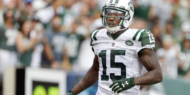 EAST RUTHERFORD, NJ - SEPTEMBER 13: Brandon Marshall #15 of the New York Jets celebrates his touchdown against the Cleveland Browns during the third quarter of a game at MetLife Stadium on September 13, 2015 in East Rutherford, New Jersey. The Jets won 31-10. (Photo by Rich Schultz /Getty Images)