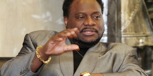 In this Jan. 18 2007 file photo, Bishop Eddie Long, of the New Birth Missionary Baptist Church, in Lithonia, Ga. gestures during an interview in Lithonia. Several men have filed a lawsuit accusing Long of exploiting his role as pastor of an Atlanta-area megachurch to coerce them into sexual relationships.