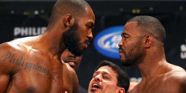 ATLANTA, GA - APRIL 20: Jon Jones (L) and Rashad Evans face off during the UFC 145 official weigh in at Fox Theatre on April 20, 2012 in Atlanta, Georgia. (Photo by Al Bello/Zuffa LLC/Zuffa LLC via Getty Images)
