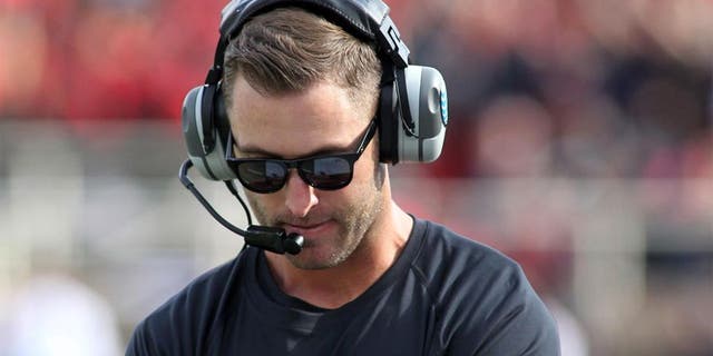 Sep 13, 2014; Lubbock, TX, USA; Texas Tech Red Raiders head coach Kliff Kingsbury looks on from the sidelines during the fourth quarter in the game with the Arkansas Razorbacks at Jones AT&amp;T Stadium. Mandatory Credit: Michael C. Johnson-USA TODAY Sports