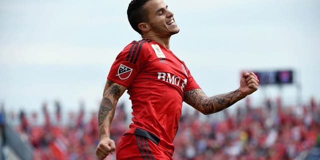 Sep 19, 2015; Toronto, Ontario, CAN; Toronto FC forward Sebastian Giovinco (10) reacts after scoring his second goal against Colorado Rapids in the first half at BMO Field. Mandatory Credit: Dan Hamilton-USA TODAY Sports