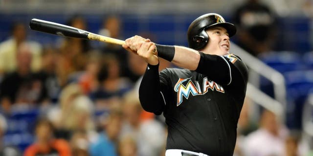 Sep 26, 2015; Miami, FL, USA; Miami Marlins first baseman Justin Bour (48) connects for a two run home run during the first inning against the Atlanta Braves at Marlins Park. Mandatory Credit: Steve Mitchell-USA TODAY Sports