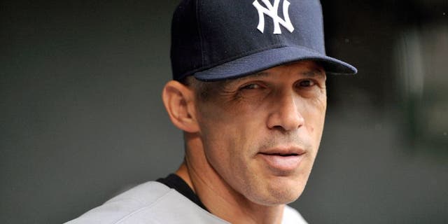 Sep 13, 2014; Baltimore, MD, USA; New York Yankees manager Joe Girardi (28) during a game against the Baltimore Orioles at Oriole Park at Camden Yards. Mandatory Credit: Joy R. Absalon-USA TODAY Sports